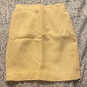Yellow pencil skirt with white, textured detailing